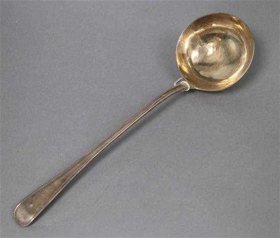 A Victorian silver Old English beaded pattern soup ladle by George Adams, London, 1871, 8.5 oz.